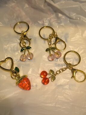 4 Piece Cherry And Strawberry Bag Charm Set